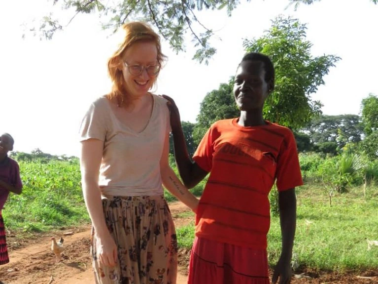 What is Esther doing in Uganda?